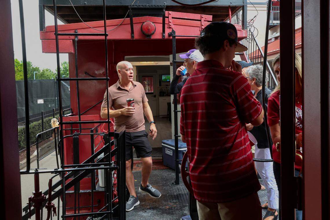 People pass between the Cockabooses before the USC game against LSU on Saturday, Sept. 14, 2024.