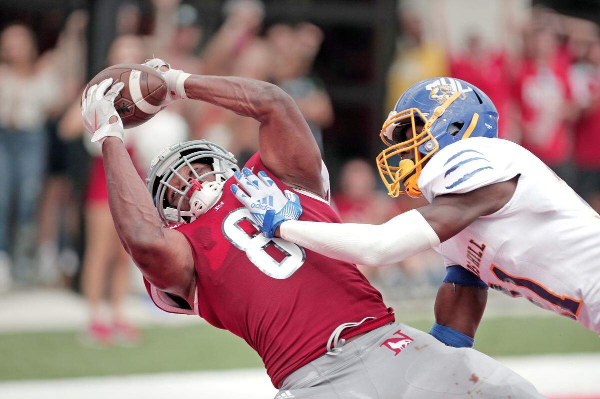 Newberry tight end Tommy Washington catches the game-winning touchdown from quarterback Dre Harris in the Wolves’ win Saturday over Mars Hill in a game played at Setzler Field.