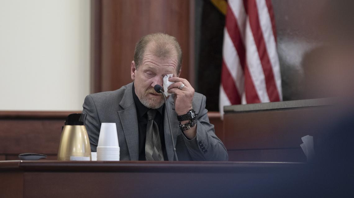 Tim Jones, Sr. wipes his eyes while answering questions during the trial of his son in Lexington. 5/29/19