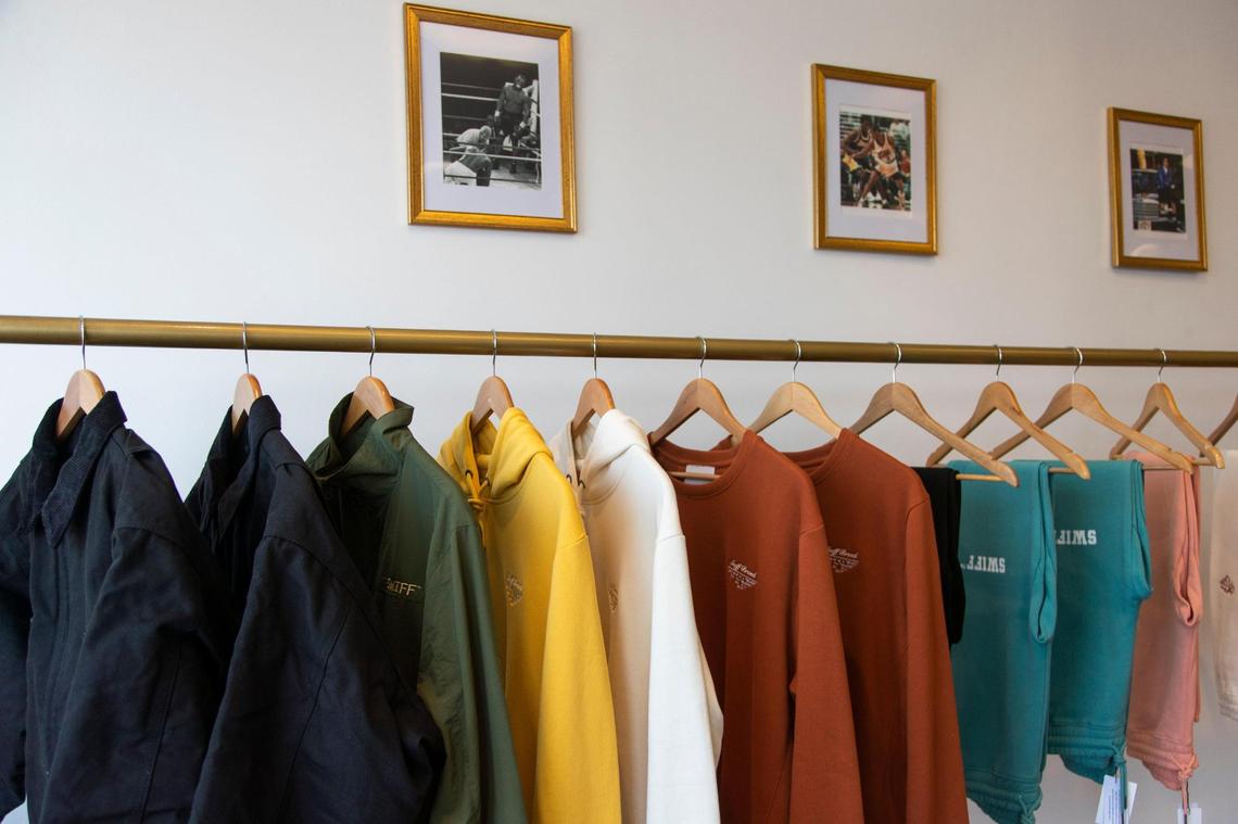 Sweatshirts and sweatpants for sale at SWIFF, a new store in Five Points on Thursday, February 24, 2022.