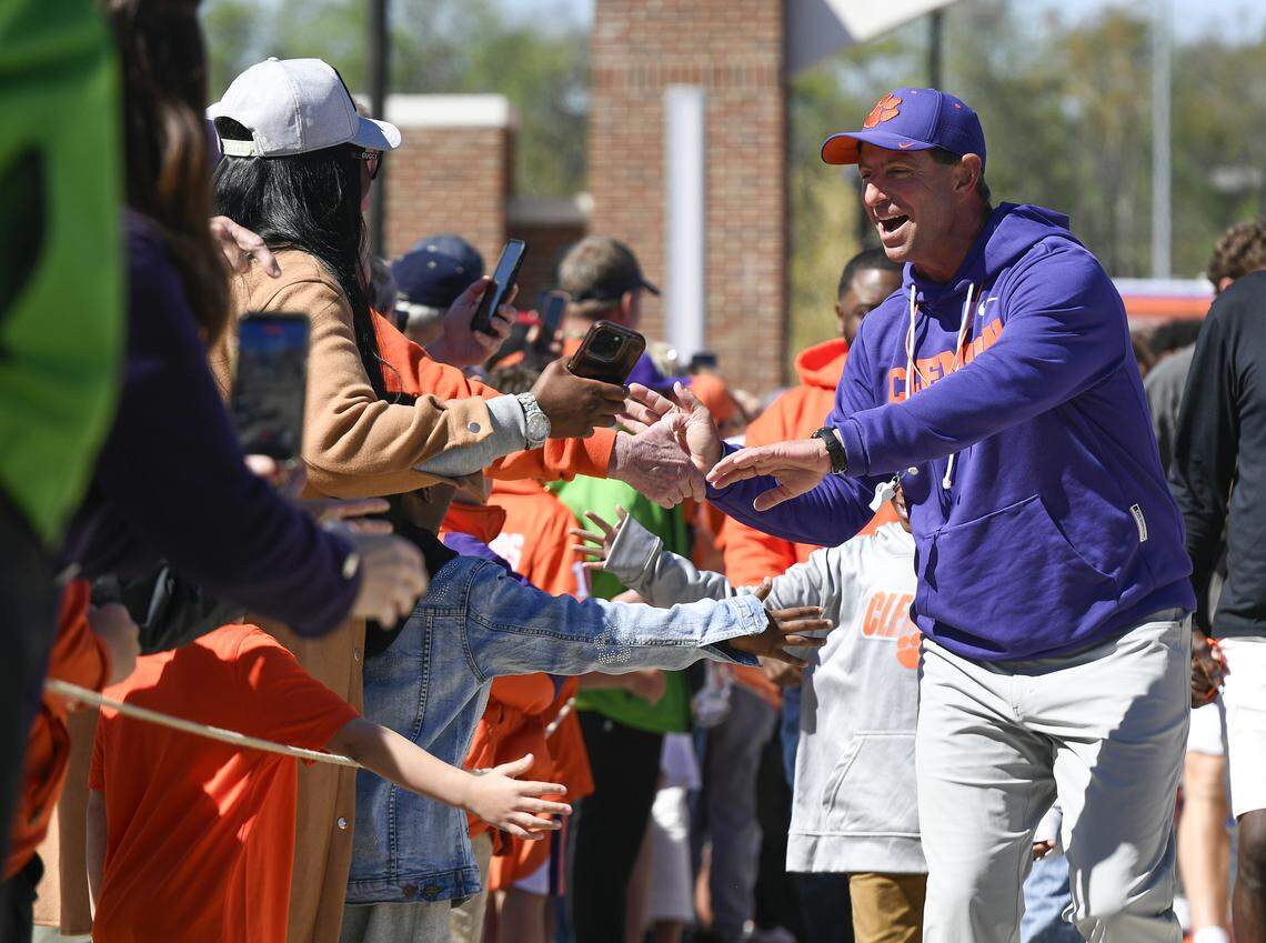 Clemson head coach Dabo Swinney shakes hands with fans during Tiger Walk before the Tiger’s annual spring game Saturday, March 28, 2026 at Clemson's Memorial Stadium.