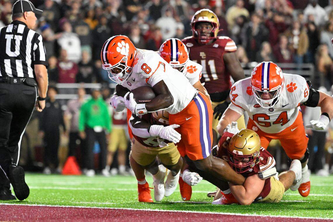 Clemson Tigers running back Adam Randall (8) runs the ball in for a touchdown against the Boston College Eagles during the first half at Alumni Stadium.