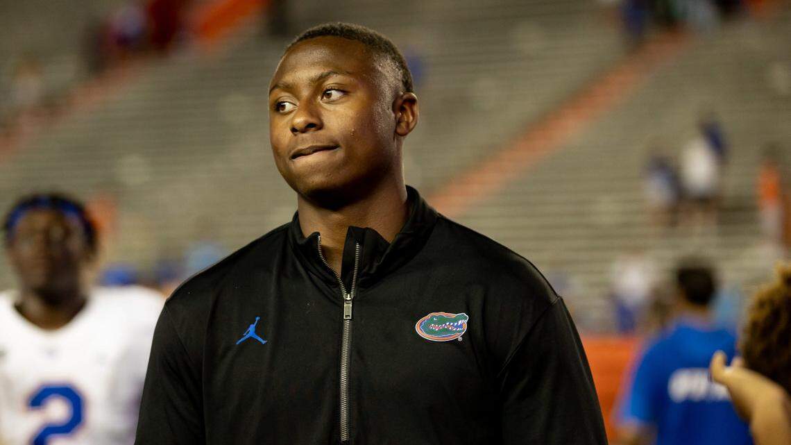 Florida Gators recruit DJ Lagway listens to Florida Gators offensive analyst for quarterbacks Ryan O’Hara speak after the game during the Florida Gators Orange and Blue Spring Game at Steve Spurrier Field at Ben Hill Griffin Stadium Thursday, April 13, 2023.