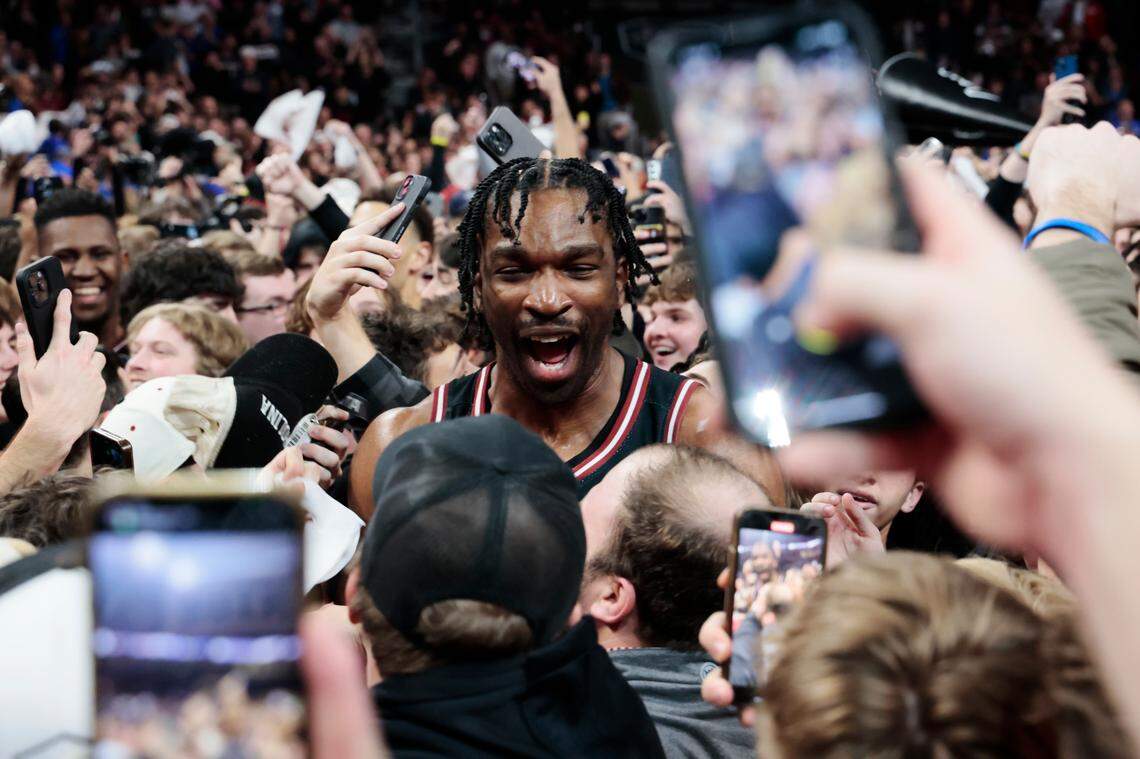 Josh Gray celebrates amid a crowd of fans Tuesday after the win over Kentucky