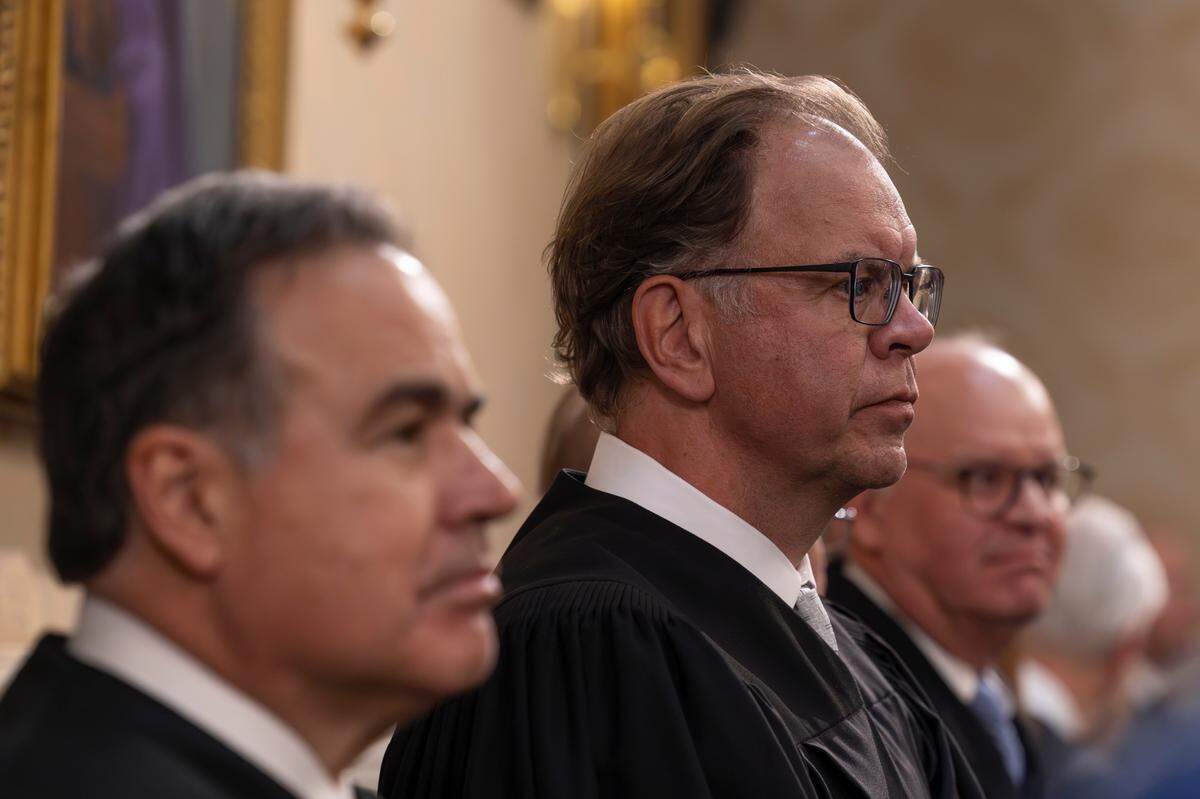 South Carolina Supreme Court Justices, from left, Chief Justice John Kittredge, Justice John Few, and Justice D. Garrison Hill attend the State of the State address during a joint session of the legislative delegation on Wednesday Jan. 29, 2025.