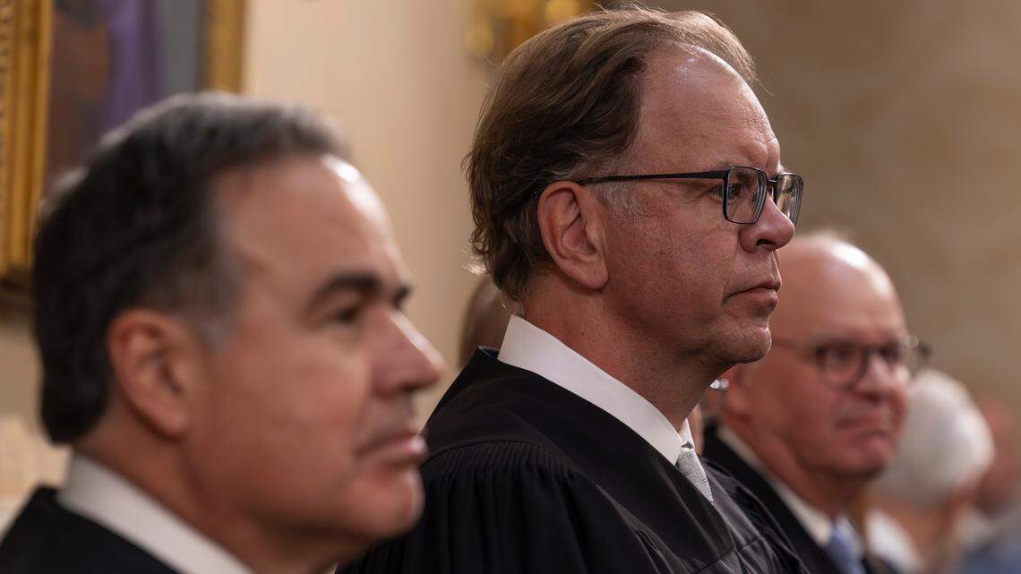South Carolina Supreme Court Justices, from left, Chief Justice John Kittredge, Justice John Few, and Justice D. Garrison Hill attend the State of the State address during a joint session of the legislative delegation on Wednesday Jan. 29, 2025.