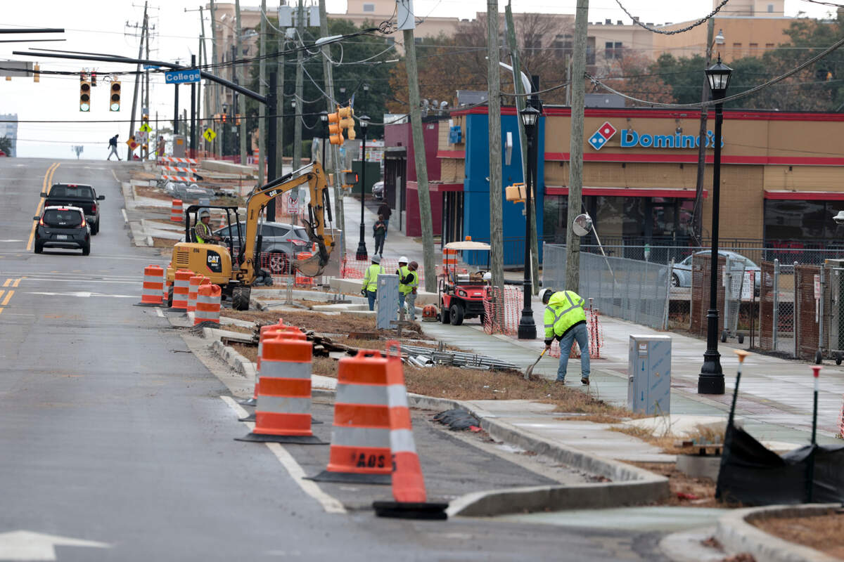 Crews continue work on the new sidewalks along South Main Street on Tuesday, Dec. 10, 2024.