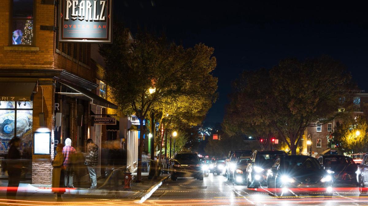 Students, locals and visitors walk from club to club in the Vista neighborhood in Columbia, South Carolina on Friday, November 18, 2022. 
