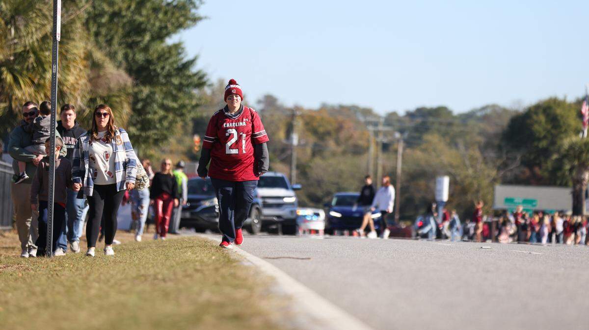 Fans make their way down George Rogers Boulevard before the Gamecocks’ game at Williams-Brice Stadium in Columbia on Saturday, November 4, 2023.