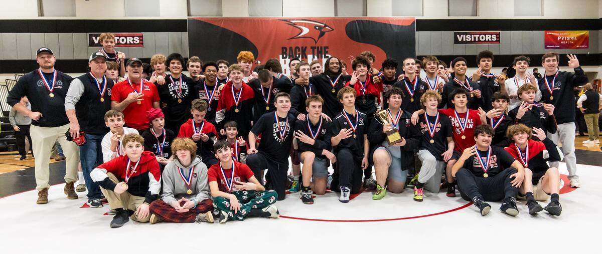 Cardinal Newman pose after winning the SCISA State Wrestling Championship at Cardinal Newman, 2/4/26.