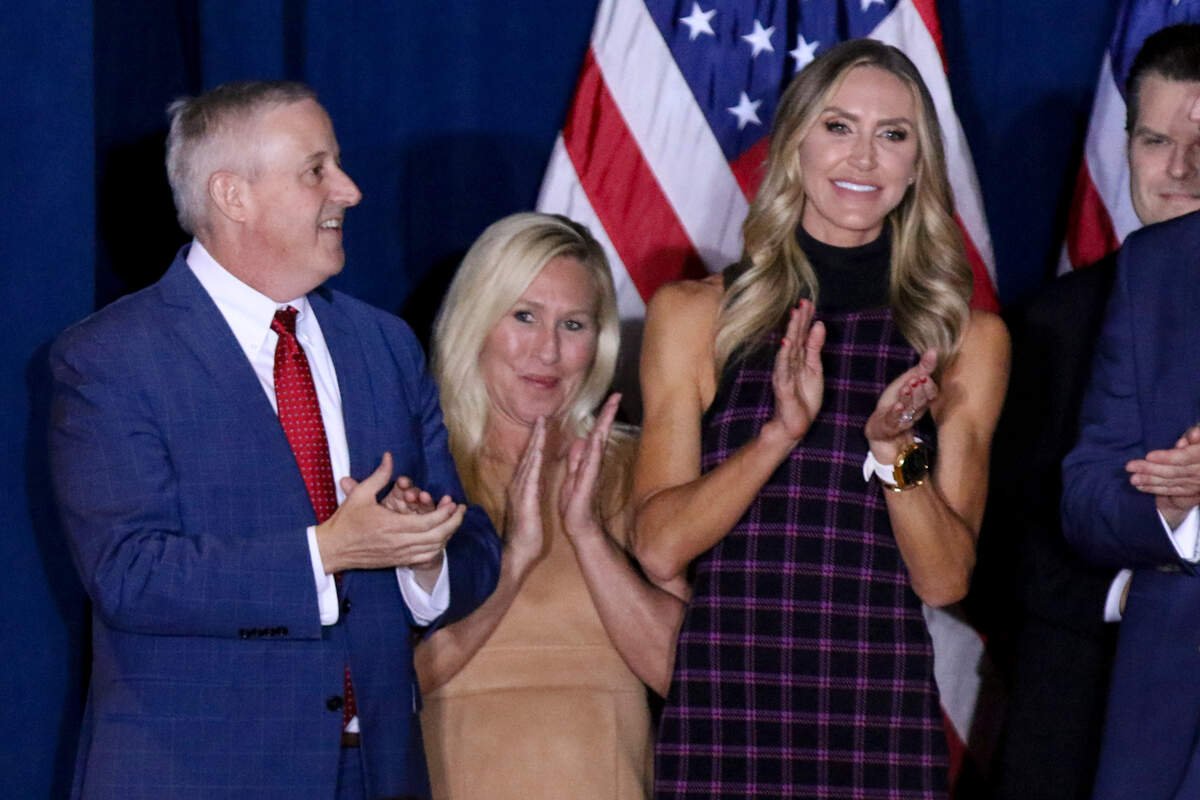 U.S. Rep. Marjorie Taylor Greene, center, joined dignitaries on stage as Donald Trump celebrated winning the South Carolina primary on Saturday, Feb. 24, 2024.