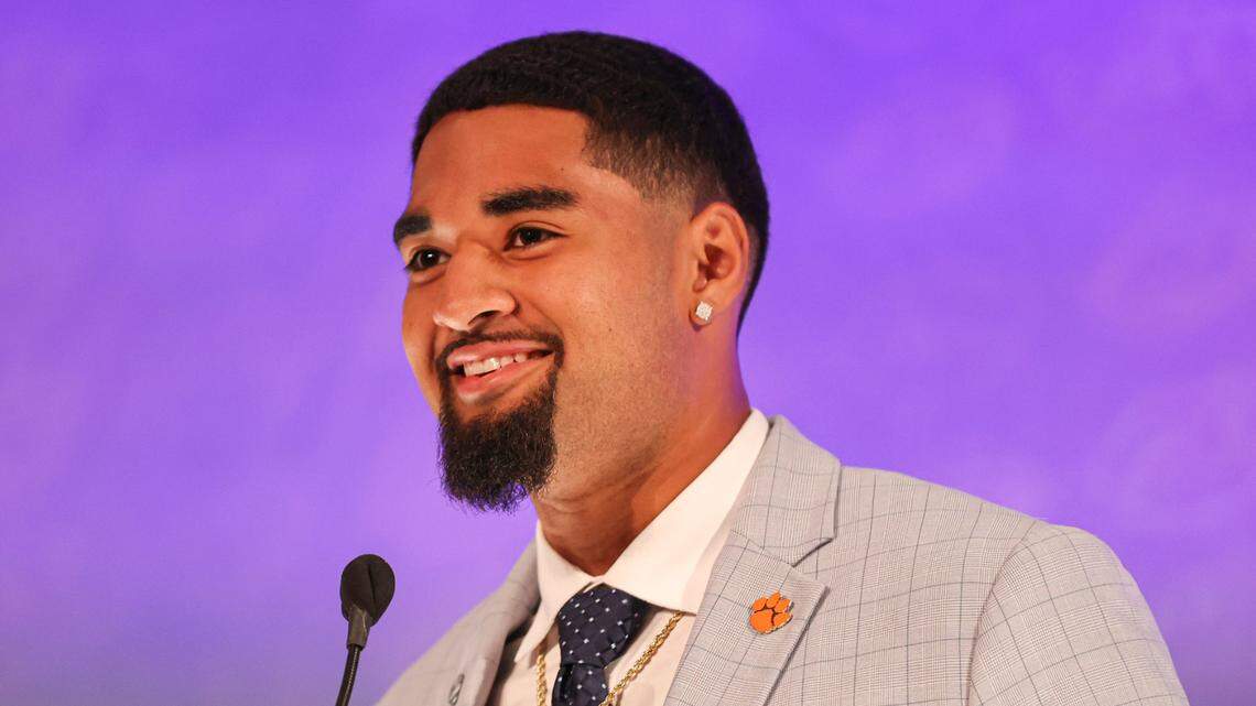 Clemson quarterback D.J. Uiagalelei answers a question during an NCAA college football news conference at the Atlantic Coast Conference media days in Charlotte, N.C., Thursday, July 22, 2021. (AP Photo/Nell Redmond)