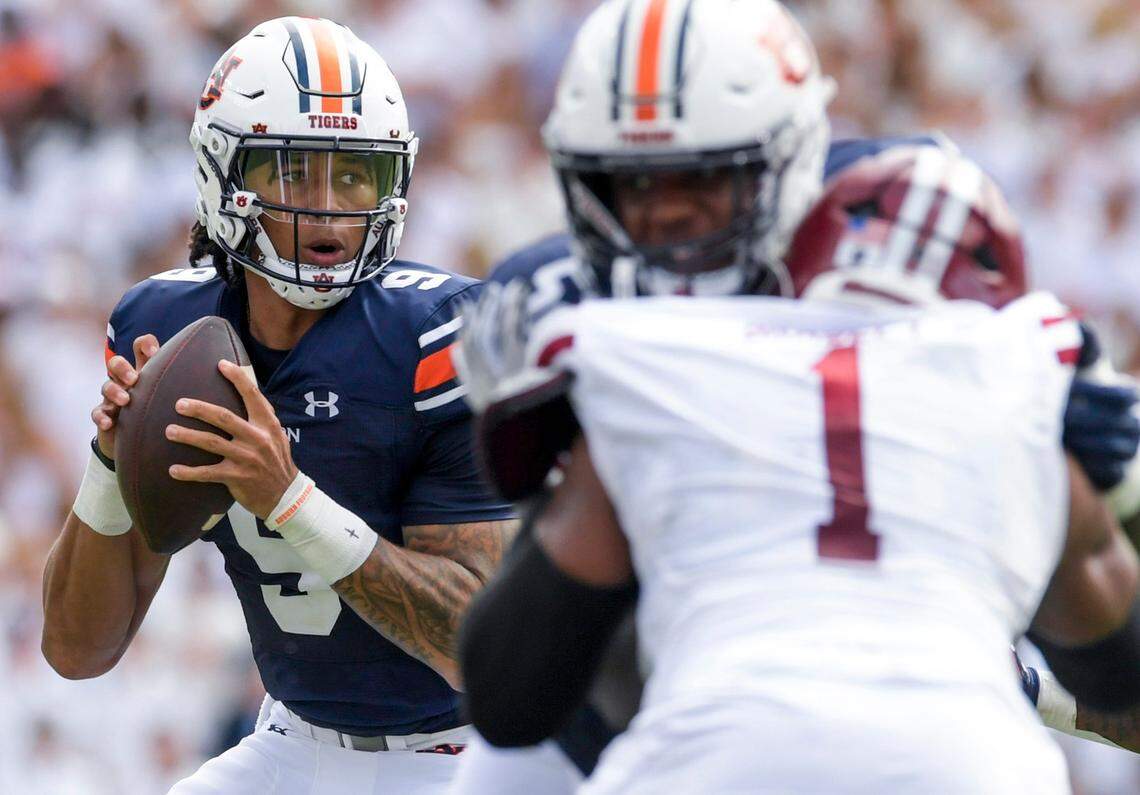 Auburn Tigers quarterback Robby Ashford (9) against UMass during their game at Jordan-Hare Stadium on the Auburn University campus in Auburn, Ala., on Saturday Sept. 2, 2023.