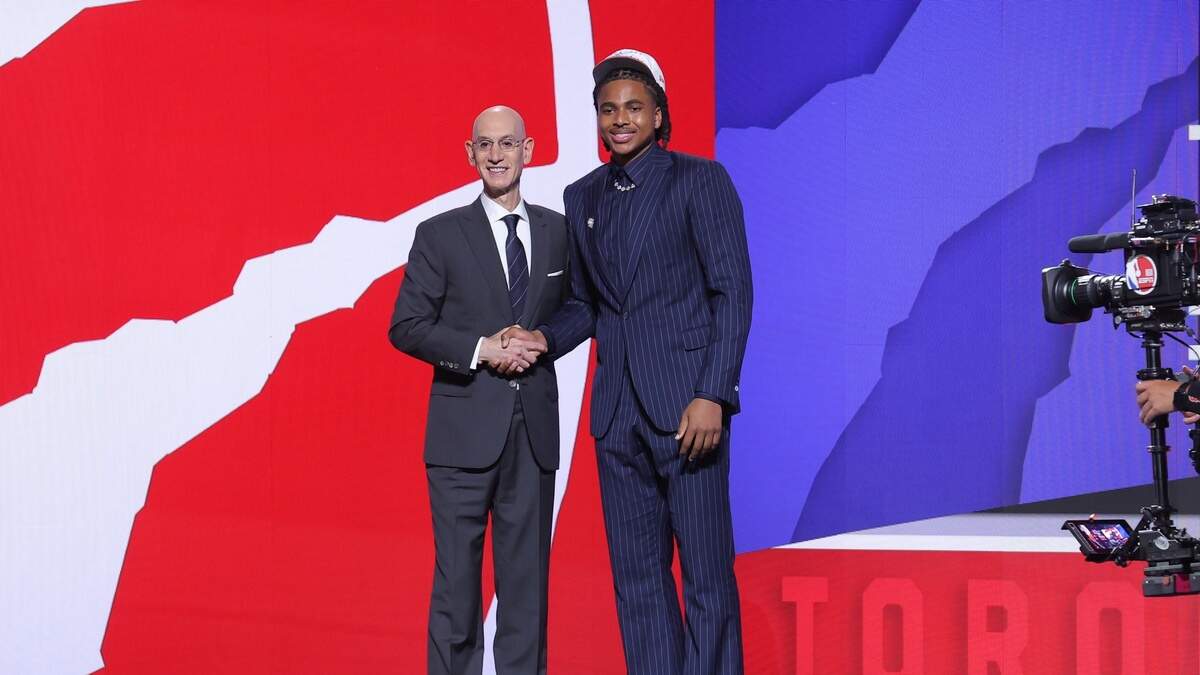 Collin Murray-Boyles stands with NBA commissioner Adam Silver after being selected as the ninth pick by the Toronto Raptors in the first round of the 2025 NBA Draft at Barclays Center.