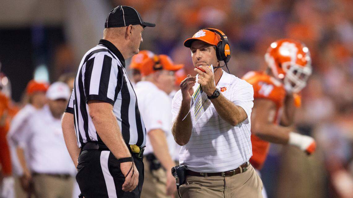 Clemson Tigers head coach Dabo Swinney calls timeout during the half of an NCAA college football game, against Boston College Saturday, Oct. 2, 2021, in Clemson, S.C. (AP Photo/Hakim Wright Sr.)