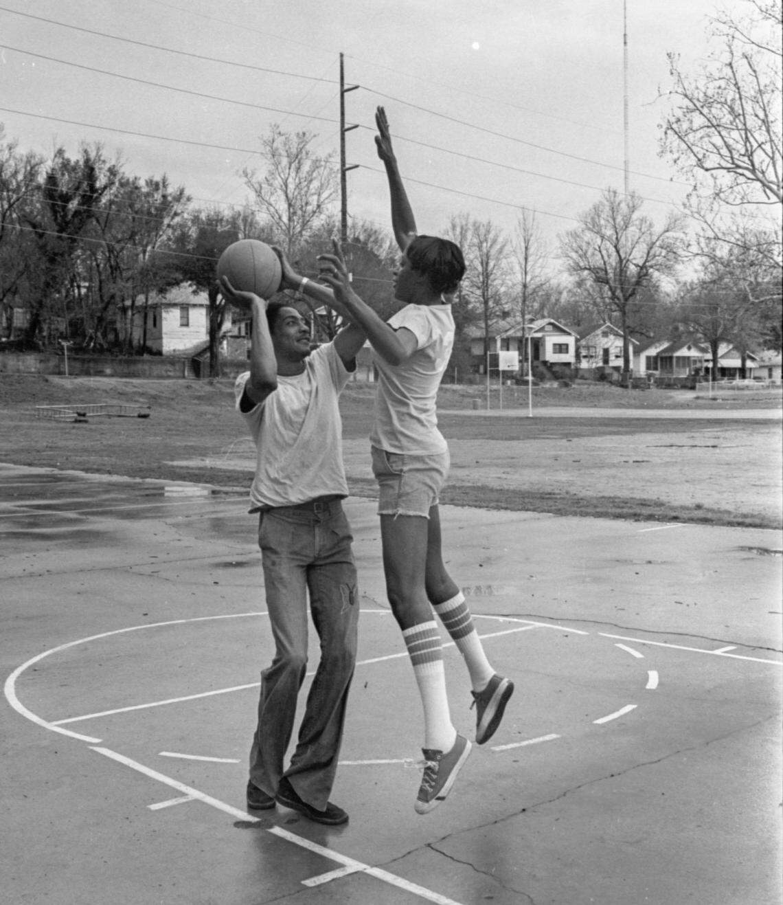 In 1975, Alex English plays basketball with his sister Margaret.
