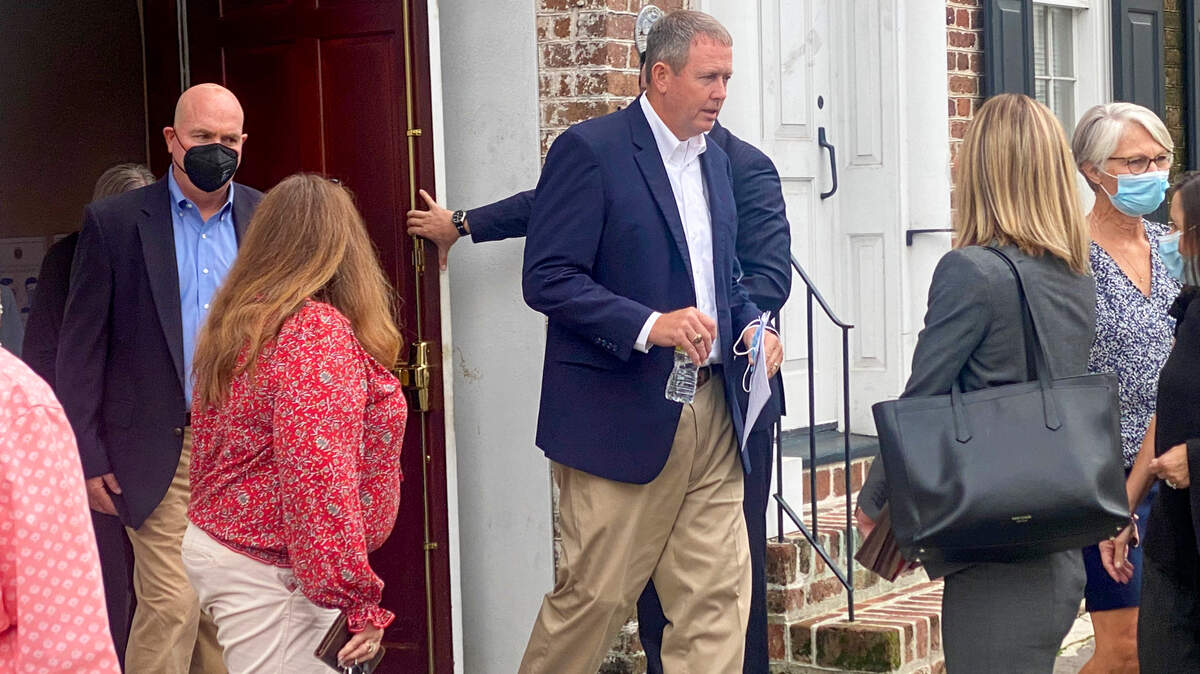 Former Palmetto State Bank CEO Russell Laffitte walks out of the federal courthouse in Charleston, S.C., on Wednesday, Aug. 24, 2022, after he was arraigned on new fraud charges.
