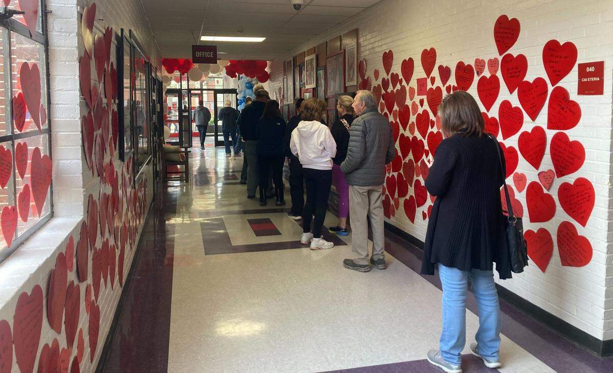 Voters line the hallway at Satcher Ford Elementary School in Columbia on Feb. 24, 2024, to cast their ballots in the S.C. Republican primary.