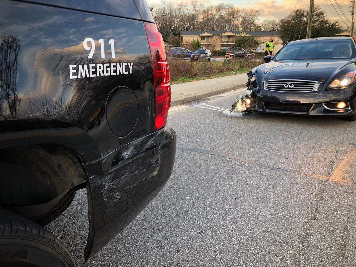 A driver was charged with DUI after colliding with a Lexington police vehicle.