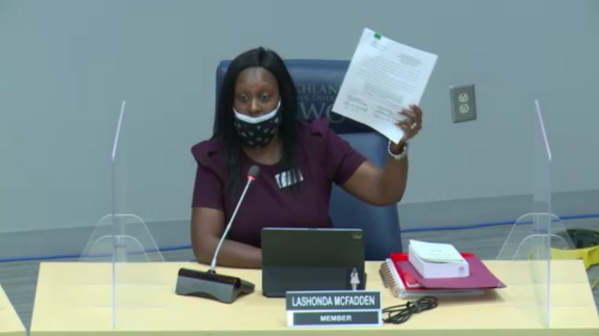 Richland 2 school board member Lashonda McFadden speaks during a school board meeting before walking out over a dispute regarding the timeliness of information the board received about potential revisions to the superintendent’s contract.