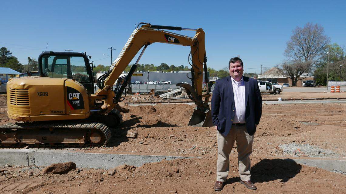 Mayor pro tem and council member Tem Miles visits a construction site near State Street in West Columbia. Where Miles stood will be turned into an easement with public art, lights, a farmer’s market structure and additional parking. It is one of multiple attractions under construction in the area.