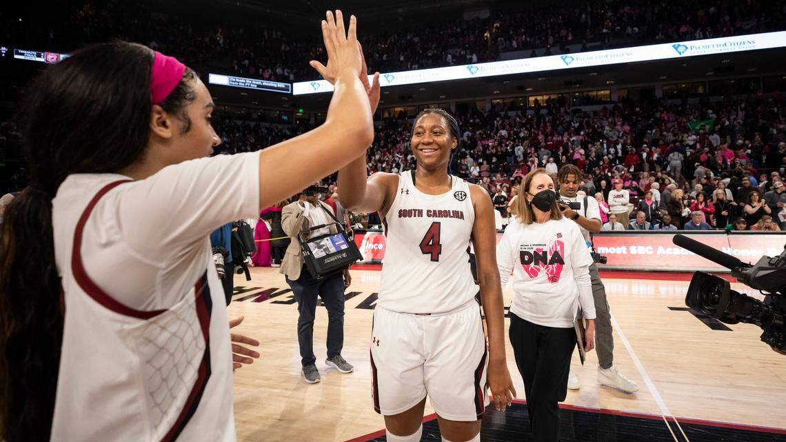 South Carolina Gamecocks forward Aliyah Boston (4) gets a high-five following South Carolina’s game against the visiting Tigers at Colonial Life Arena in Columbia on Sunday, February 12, 2023.