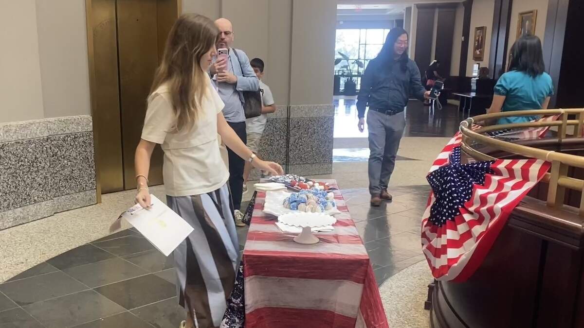 Elena Maria Vitale, a 25-year-old from Italy, left the federal courtroom in Columbia Thursday as a U.S. citizen and grabbed information on how to register as an S.C. voter.