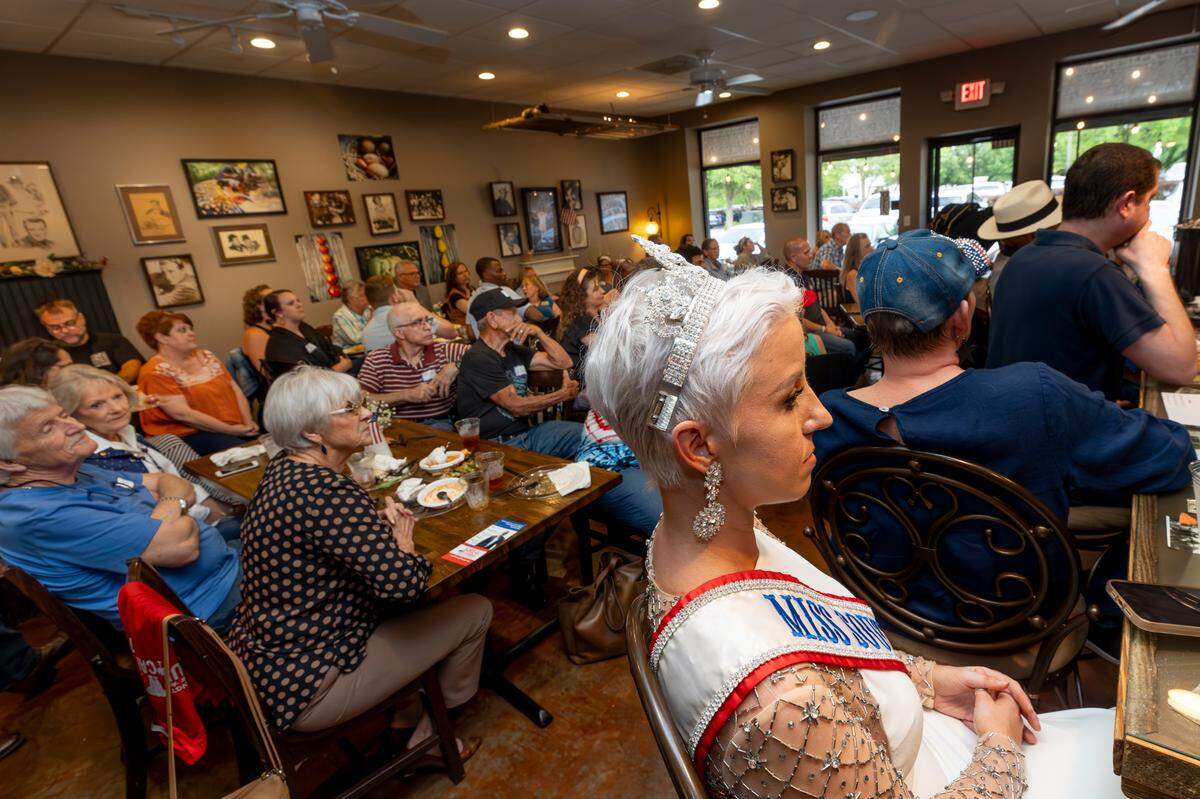 Sarah Grace Allen, sits at her family’s restaurant, Momma Rabbit’s Nibbles and Sips during a Freedom Friday gathering on Friday, May 3, 2024. Allen is Miss S.C. in the Miss For America Strong pageant.