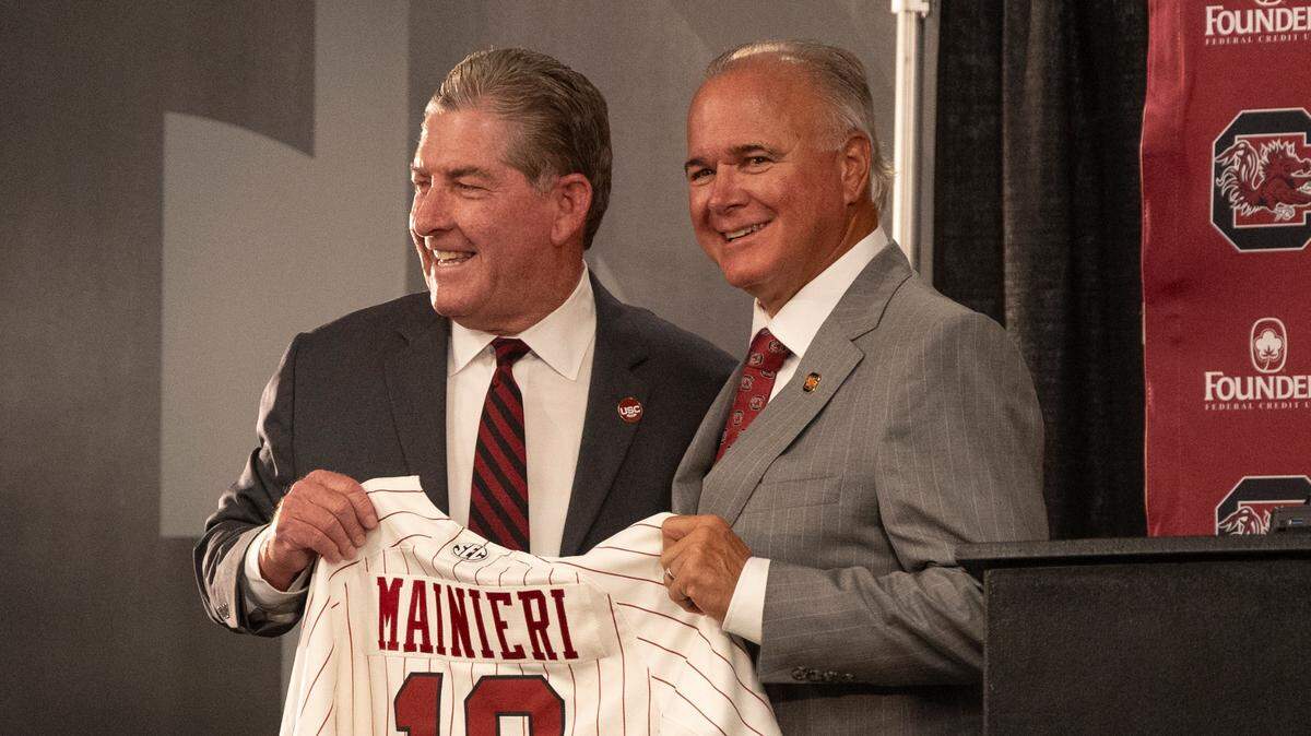 University of South Carolina Athletic Director Ray Tanner presents the school’s new baseball coach, Paul Mainieri, during a press conference on Thursday, June 13, 2024.