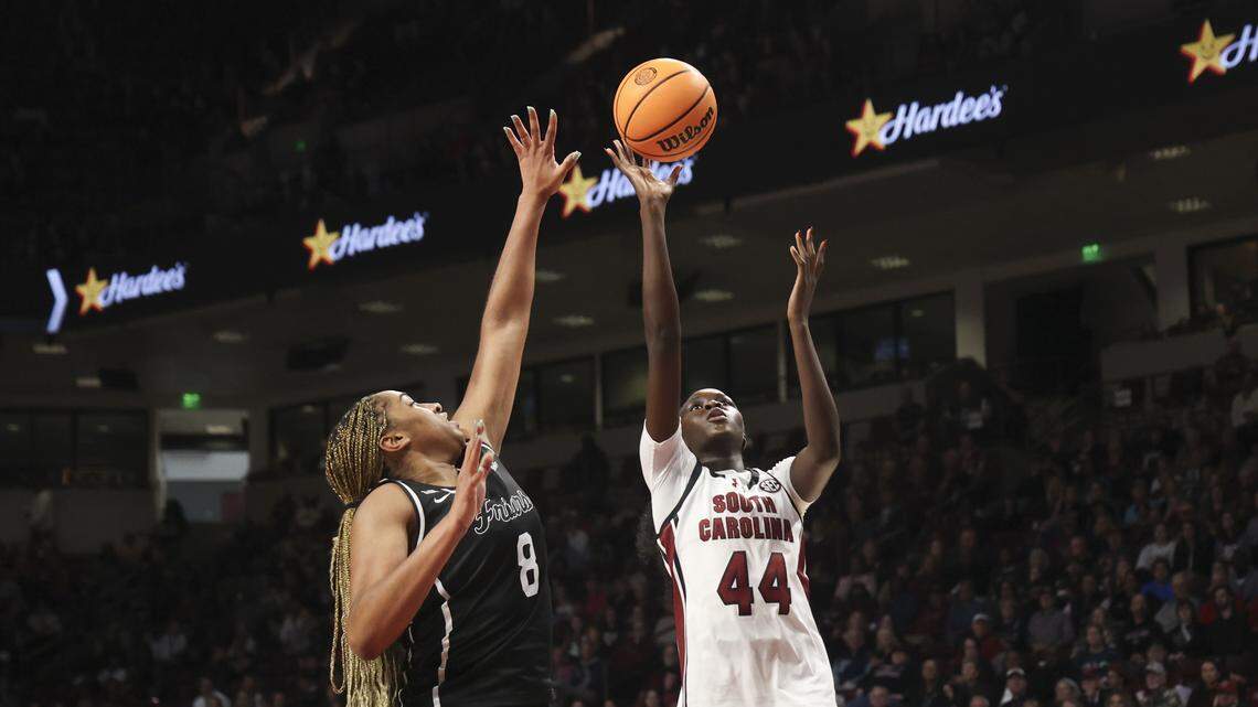 South Carolina's Agot Makeer (44) shoots as Providence College's Nalani Kaysia (8) pressures during the second half of action of their women's basketball game against Providence at Colonial Life Arena on Sunday, Dec. 28, 2025.