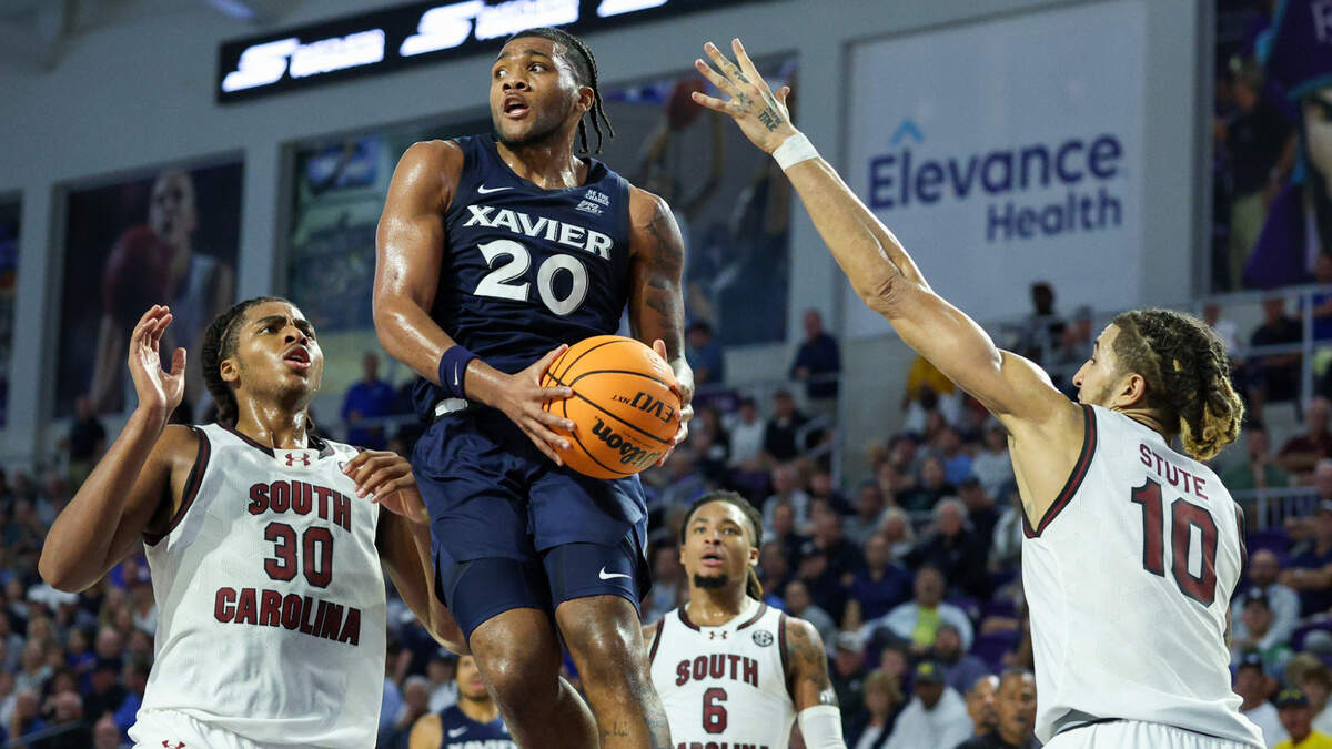 Xavier Musketeers guard Dayvion McKnight (20) looks to pass the ball against the South Carolina Gamecocks in the first half at Suncoast Credit Union Arena.