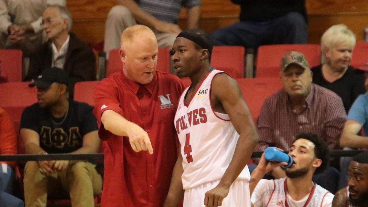 Newberry men’s basketball coach Dave Davis, left, is leaving the school for an assistant coaching job at Winthrop University.