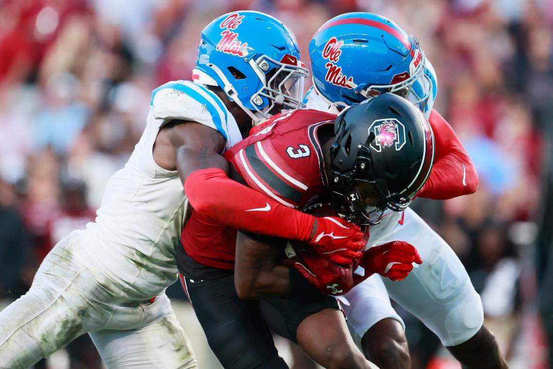 South Carolina wide receiver Mazeo Bennett Jr. (3) is taken down by mississippi defenders on Saturday, October 5, 2024. 