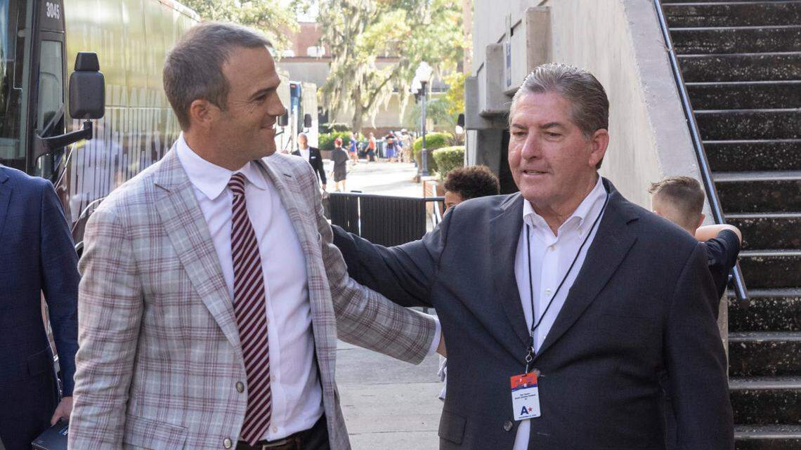 South Carolina head coach Shane Beamer speak with athletic director Ray Tanner at Ben Hill Griffin Stadium in Gainesville, FL on Saturday, Nov. 12, 2022.
