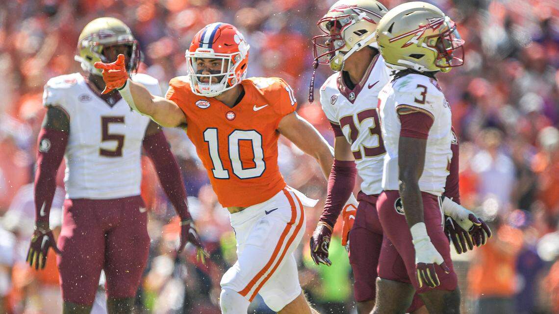 Sep 23, 2023; Clemson, South Carolina, USA; Clemson Tigers wide receiver Troy Stellato (10) reacts after catching a ball against Florida State Seminoles defensive back Kevin Knowles II (3) for a first down during the third quarter at Memorial Stadium.