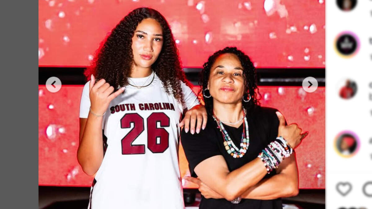Kaeli Wynn with South Carolina coach Dawn Staley