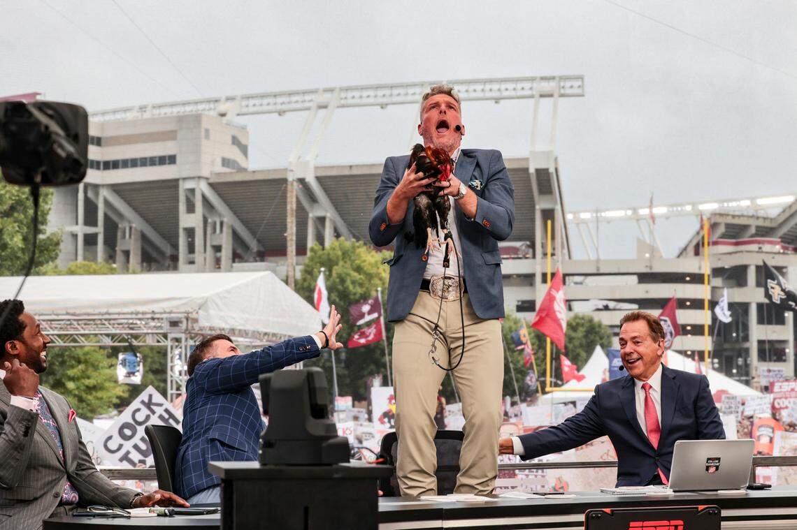 Pat McAfee holds Sir Big Spur during the broadcast of ESPN College Gameday at Gamecock Park on Saturday, Sept. 14, 2024.