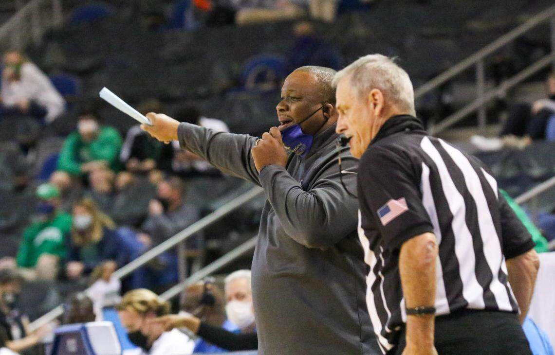 Keenan coach Reggie McLain yells to his team during the 3A state championship game against Bishop England at the USC Aiken Convocation Center on Friday, March 5, 2021.