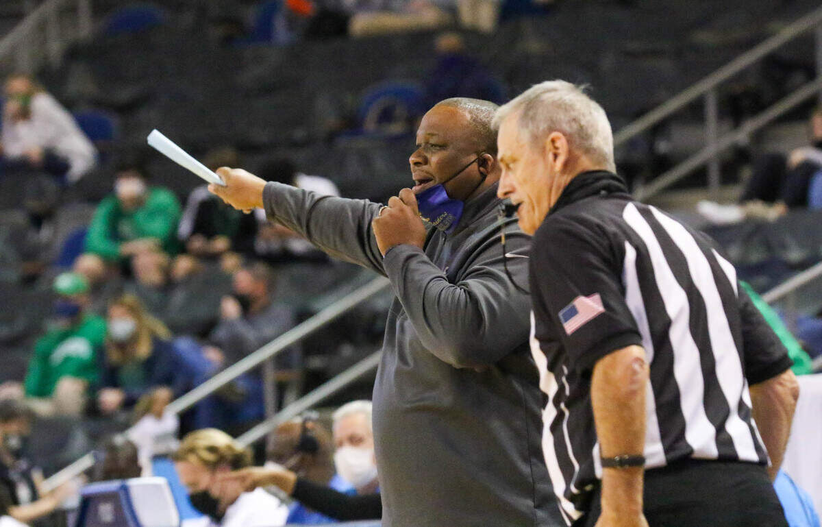 Keenan coach Reggie McLain yells to his team during the 3A state championship game against Bishop England at the USC Aiken Convocation Center on Friday, March 5, 2021.