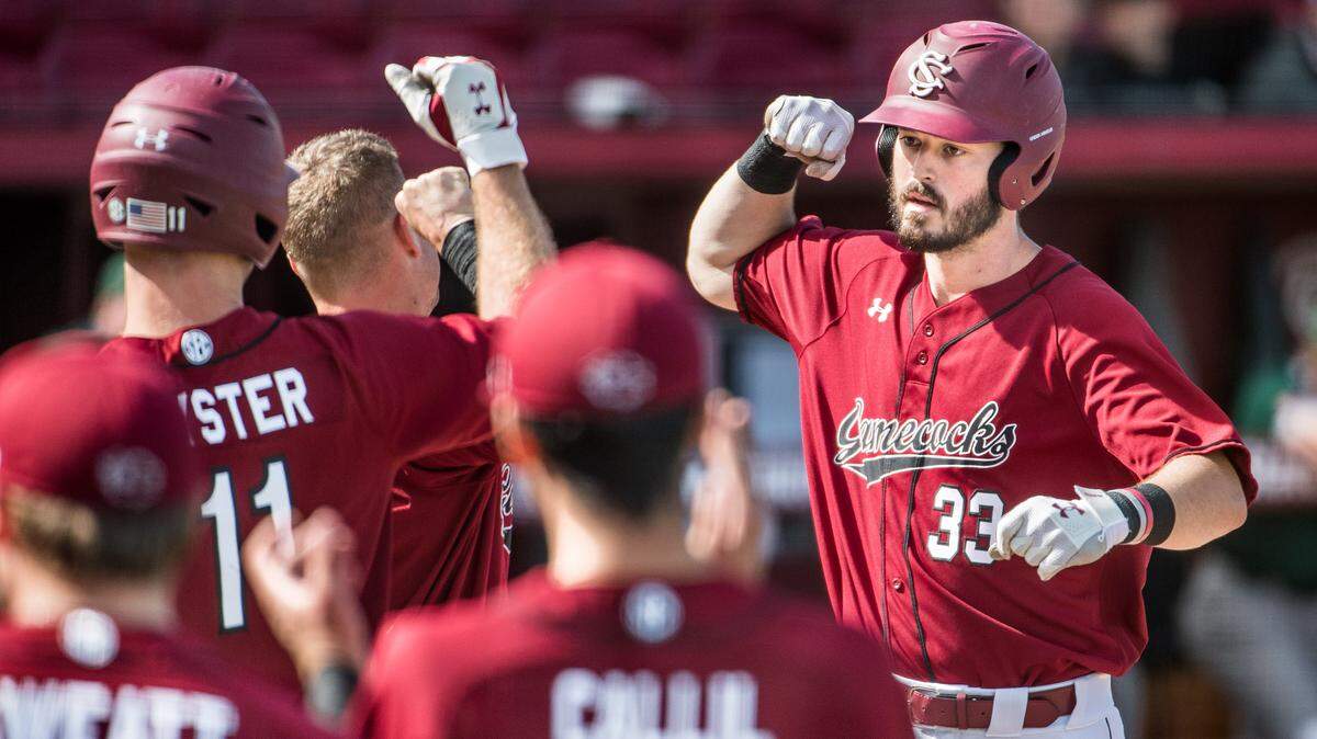 South Carolina catcher Chris Cullen is greeted by teammates after his second inning home run during a game against Utah Valley at Founders Park Sunday, Feb. 24, 2019, in Columbia, S.C.