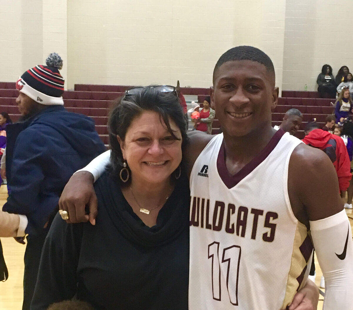 Greenwood teacher Diana Pearson poses with Kentavius Williams, a senior at Ninety-Six High School and a basketball player.