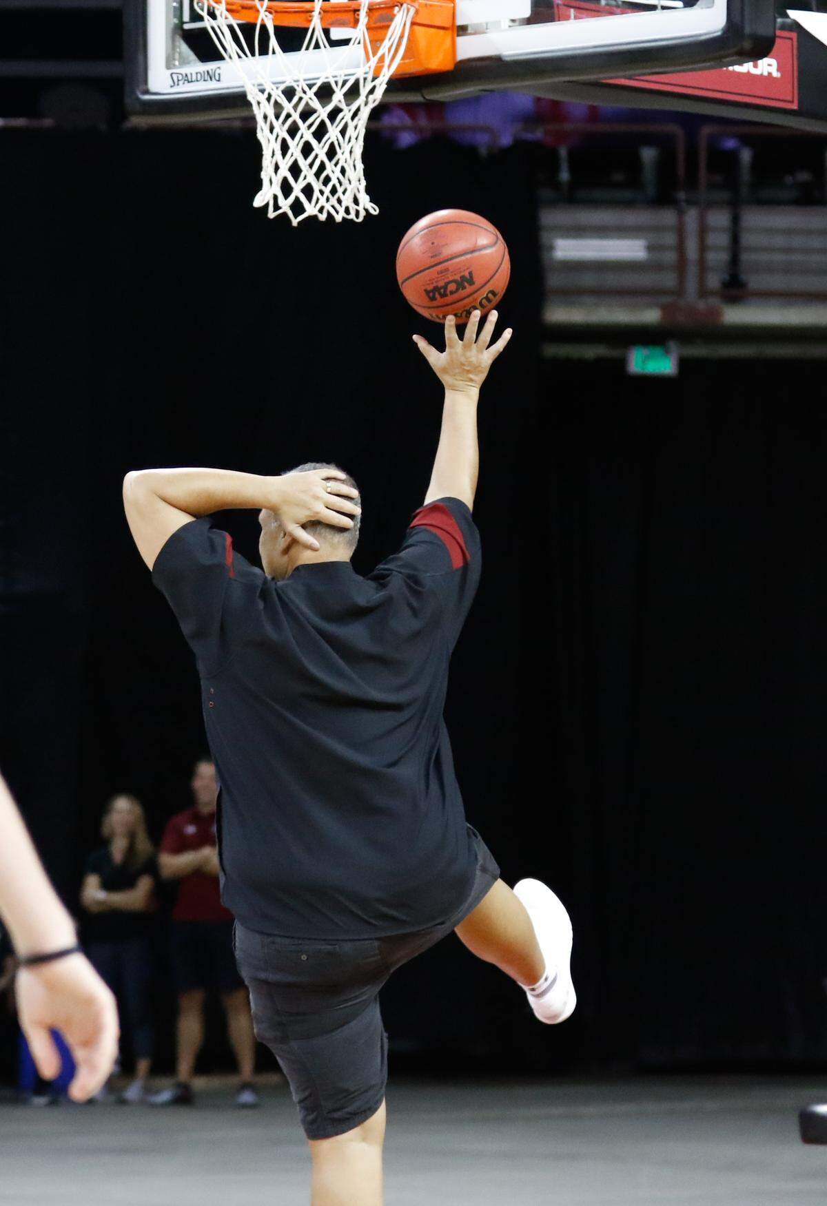 The University of South Carolina basketball coach Frank Martin makes a goofy layup during a tip-off event at the Colonial Life Arena. 10/5/18