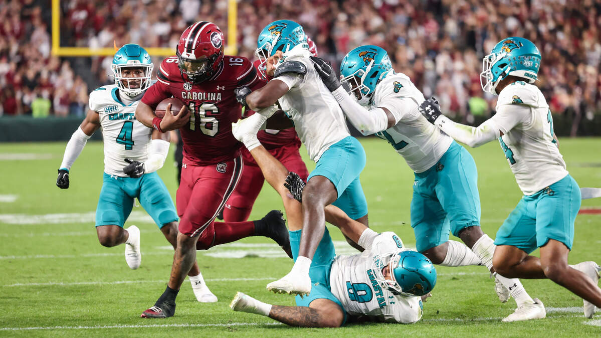 South Carolina quarterback Lanorris Sellers (16) is chased down by a pack of Coastal Carolina defenders during first half of the Gamecocks’ game against Coastal Carolina at Williams-Brice Stadium in Columbia on Saturday, November 22, 2025.


