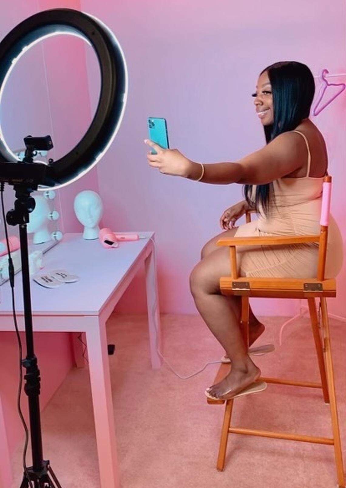 Chamia Pinckney takes a selfie at Selfie Mania in Columbia, SC.