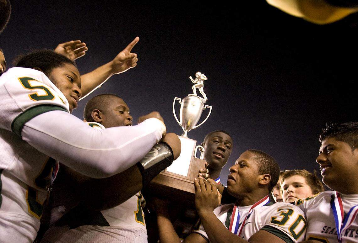The Myrtle Beach Seahawks celebrate after defeating South Pointe 27-23 to win the Class 3A state championship at Williams-Brice Stadium in Columbia in December 2010.