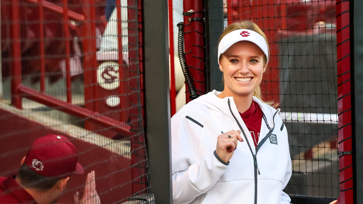 South Carolina Gamecocks head coach Ashley Chastain Woodard directs her team Thursday against the Virginia Cavaliers at Carolina Softball Stadium in Columbia.