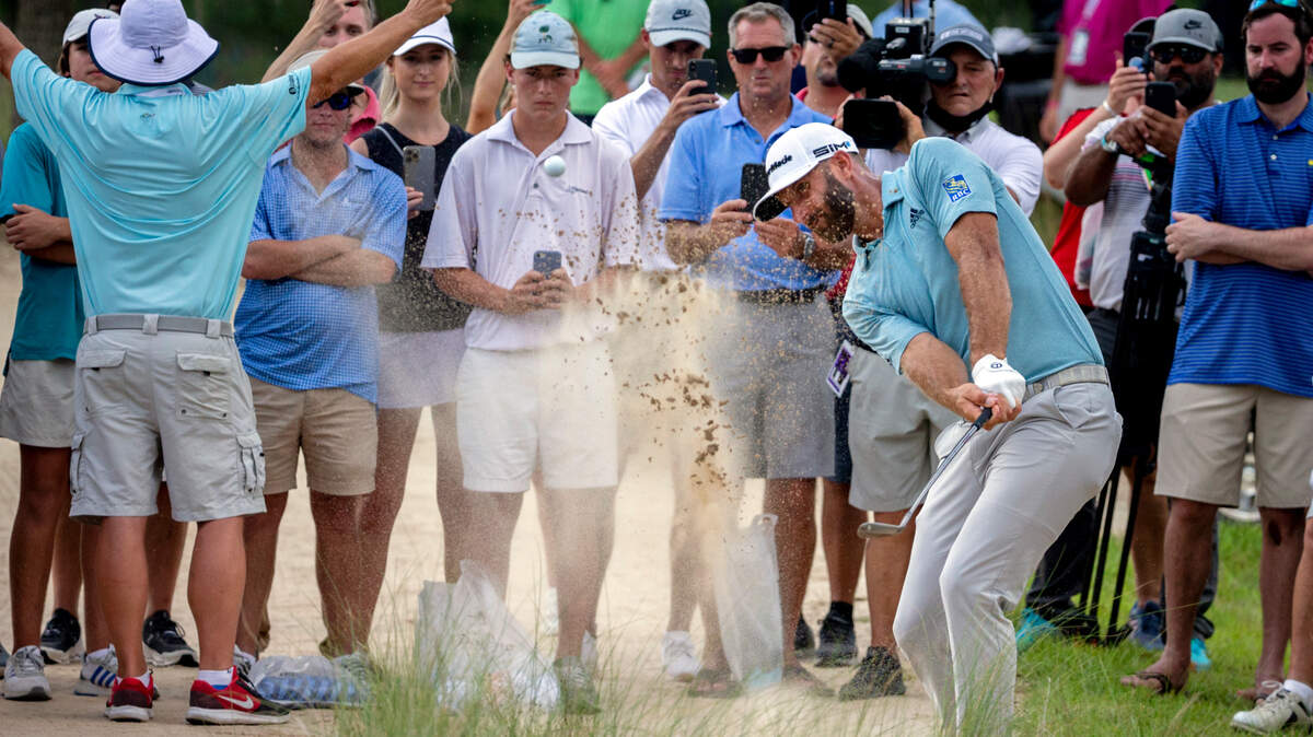 Dustin Johnson his out of the rough on near the 12th green during the third round of the Palmetto Championship golf tournament in Ridgeland, S.C., Saturday, June 12, 2021. (AP Photo/Stephen B. Morton)