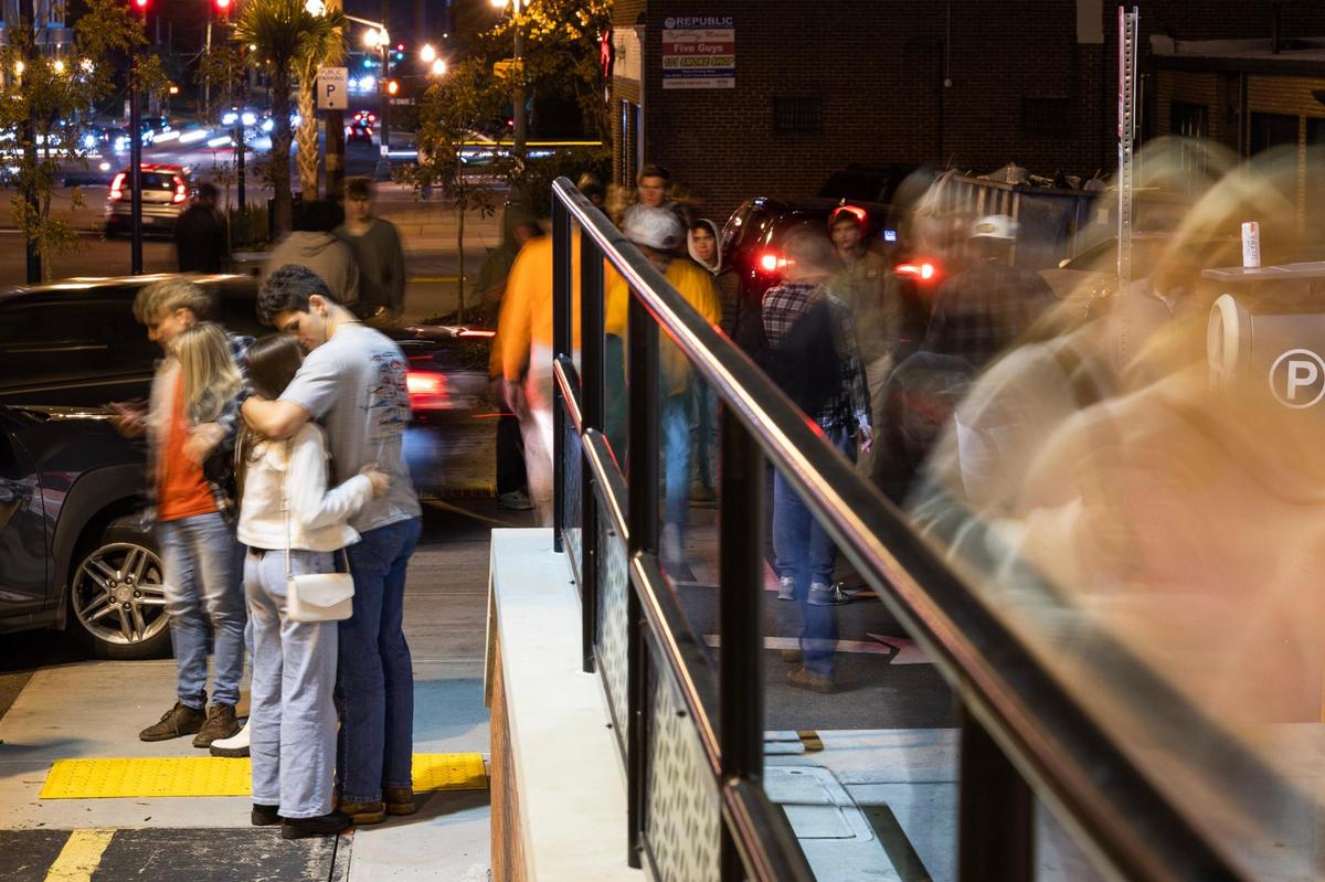 Students, locals and visitors walk from club to club in the Vista neighborhood in Columbia, South Carolina on Friday, November 18, 2022. Students and business owners have noticed a shift in Colubmia’s nightlife scene.