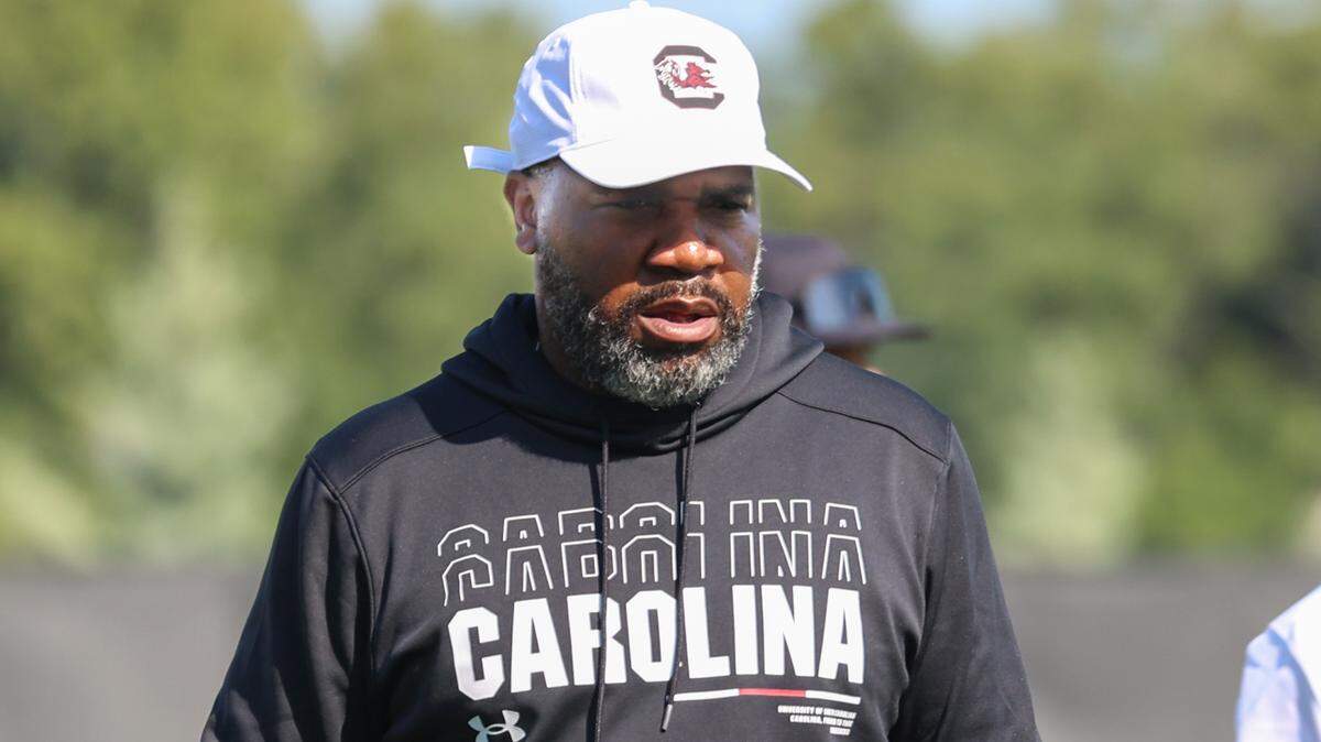 Running backs coach Marquel Blackwell watches drills during the University of South Carolina’s first football practice of the 2025 season on Friday, Aug. 1, 2025.