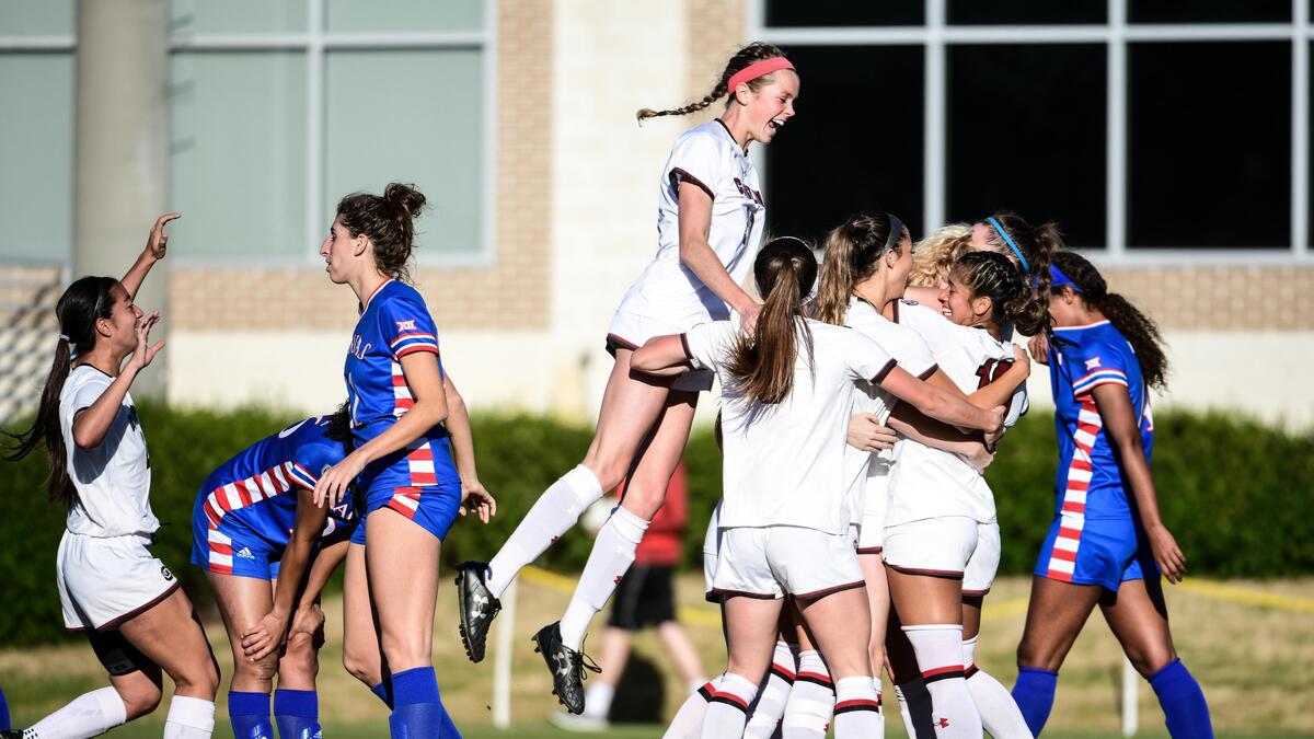 South CarolinaÕs Sutton Jones leaps into a celebration with teammates after the Gamecocks first goal against Kansas during the third round of the NCAA tournament at Stone Stadium Sunday, Nov. 24, 2019, in Columbia, S.C. The Gamecocks defeated Kansas 2-0 and advance to the quarter finals.